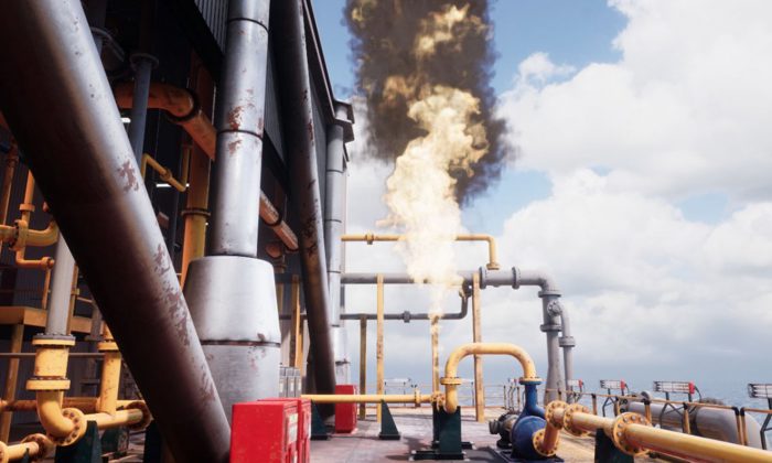 A large industrial facility emitting a significant cloud of black smoke and flames from a pipe structure, surrounded by yellow and silver pipes, under a partly cloudy sky.