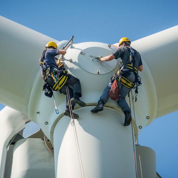 two wind turbine technicians working